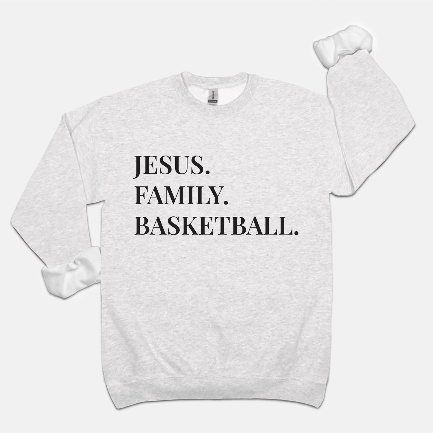 "Jesus. Family. Basketball." Unisex Crew Neck Sweatshirt with Black Lettering